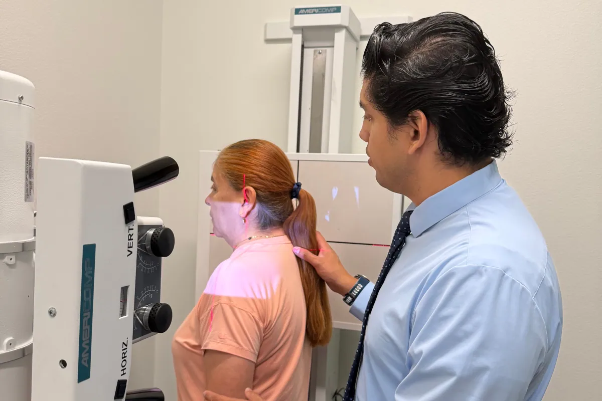 Chiropractic examination neck pain relief spinal adjustment bentonville ar