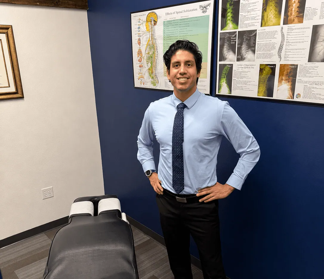 Dr. Jose Zamora in his chiropractic office in Bentonville, AR