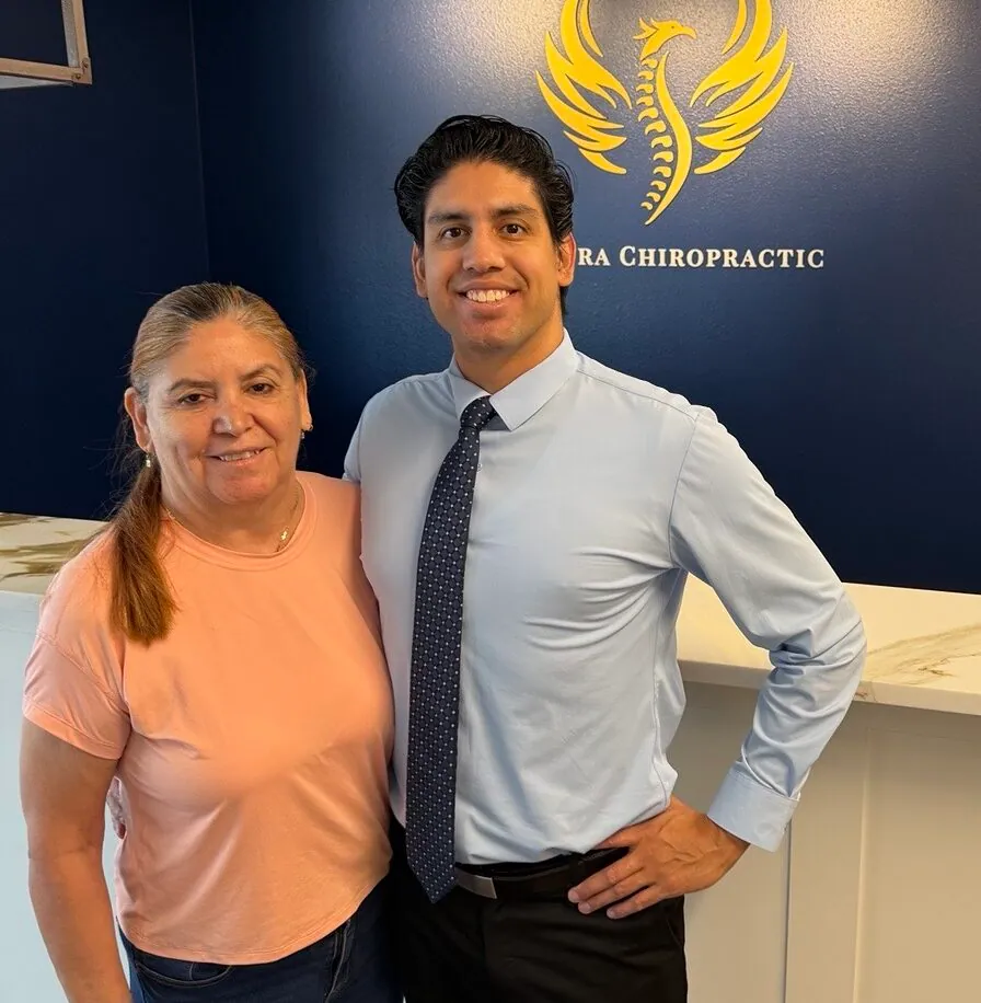 Dr. Jose Zamora with a patient at Zamora Chiropractic